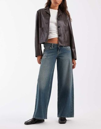 Hollister jeans fit baggy a vita ultra bassa con dettagli ricamati, lavaggio blu scuro
