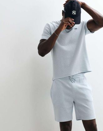 HUGO BOSS Pantaloncini azzurri a nido dape con stampa del logo in coordinato-Blu