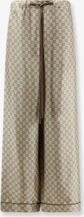Gucci Pantaloni in seta con motivo GG all-over - GUCCI - gender_Woman