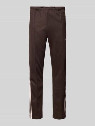 adidas Originals Sweatpants mit elastischem Bund in Dunkelbraun, Gr&ouml;&szlig;e XXL
