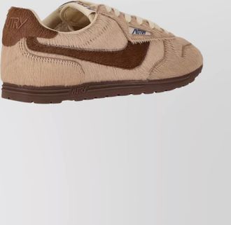 Autry low sneakers with rubber sole and texture