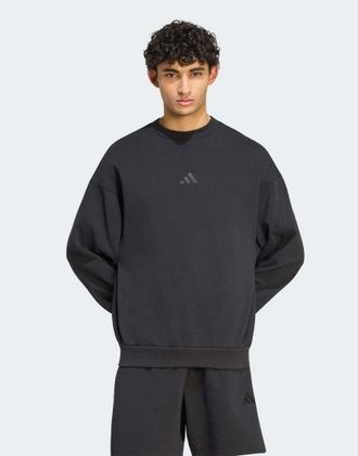 adidas Felpa nera con logo piccolo-Nero