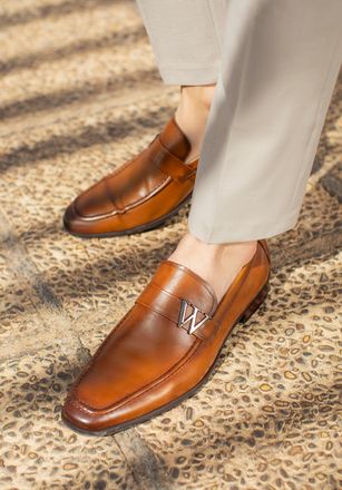 Wittchen Heren mocassins van echt leer met metalen logo, bruin