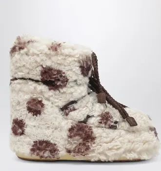 Moon Boot Icon Low curly boot with cow print