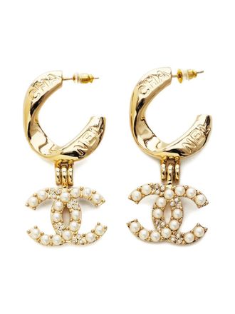Chanel 2024 interlocking CC logo drop earrings - women - Gold Plated - One Size