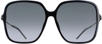 Gucci GG1267S 001 glanzend zwart en goud grijs gradi&euml;nt zonnebril