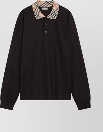 Burberry polo shirt featuring checked collar and long sleeves