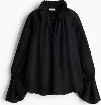 H&M Bestickte Bluse aus Leinengemisch - Schwarz