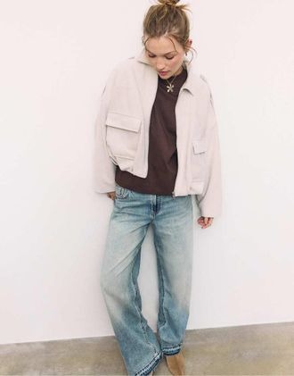 Stradivarius Giacca bomber &eacute;cru in camoscio sintetico-Bianco