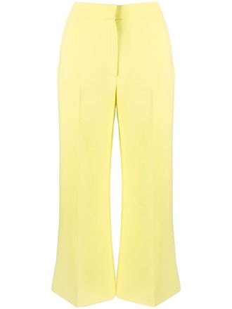 Pucci pressed-crease flared trousers - women - Viscose - 44 - Yellow