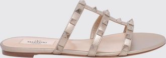 Valentino Garavani Sandali bassi Rockstud in pelle laminata con borchie