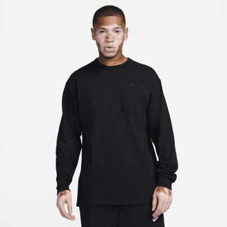 Nike Mens Nike Sportswear Premium Essentials Long-Sleeve Pocket T-Shirt in Black | DR7929-011