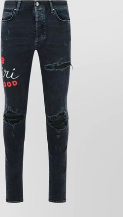 Amiri distressed cotton jeans embroidered design