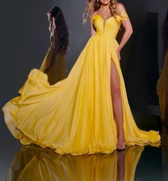 Jovani Off The Shoulder Gown With Cut-Out Lace Up Back In Yellow