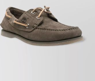 Timberland boat shoes with contrast stitching and eyelet detailing