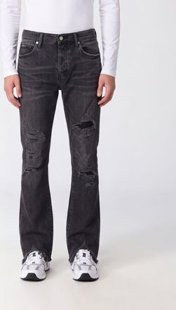Purple Jeans slim flared in denim stretch nero con effetto usurato