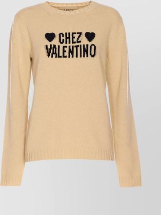 Valentino Garavani knitwear with graphic text and heart motifs