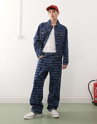 Icecream Jeans dritti in denim lavaggio blu medio con monogramma in coordinato