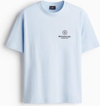 H&M Bedrucktes T-Shirt in Loose Fit - Hellblau/Wickford Hills