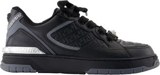 Versace Zwarte Leren Sneakers - Gladde Kalfshuid - Heren - Sneakers - Zwart - 45 EU - Leer - Schoenen