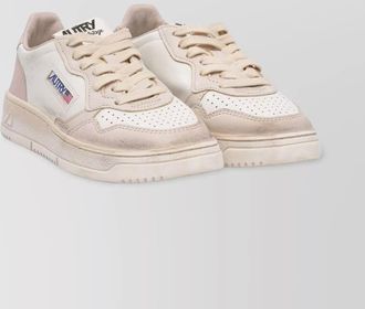 Autry low-top sneakers with perforated toe and textured heel