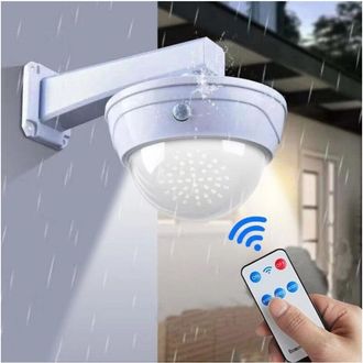 Trade Shop Trade Shop - Camara Falsa Con Panel Solar Con Sensor De Movimiento Foco 44led