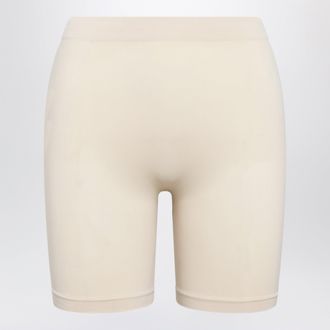 SKIMS Pantaloncini a met&agrave; coscia Seamless Sculpt color sabbia