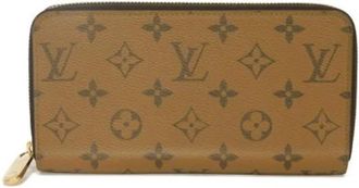 Louis Vuitton Pre-owned Zippy Wallet Monogram Reverse Canvas Long Wallet - Dames - Vintage Accessoires - Bruin - ONE Size - Leer - Vintage