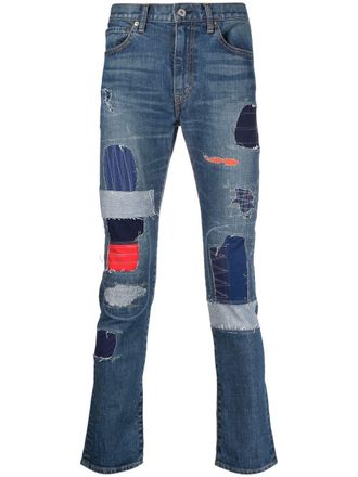 Junya Watanabe Jeans slim con design patchwork - Blu