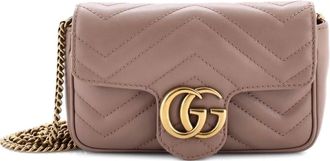 Gucci Borsa a tracolla GG Marmont mini in pelle matelass&egrave; con battente - Toni neutri