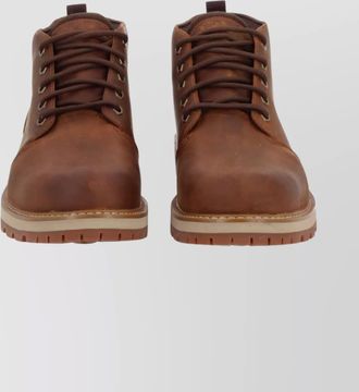 Timberland round toe boots with pull tab and rubber sole