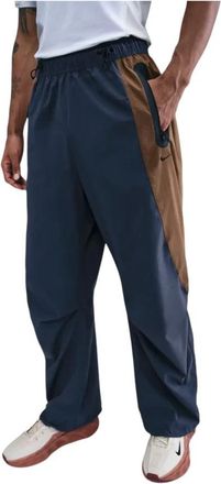 Nike Tech Dri-FIT Woven Colour-Block Oversized Broek - Heren - Trainingsbroeken - Blauw - L - Nylon - Fitness