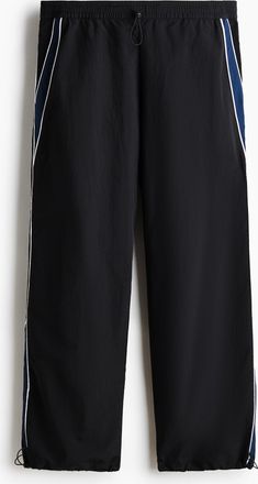 H&M Trainingshose aus Nylon in Loose Fit - Schwarz