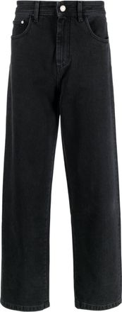 GCDS graffiti-print wide-leg jeans - men - Cotton - 34 - Black