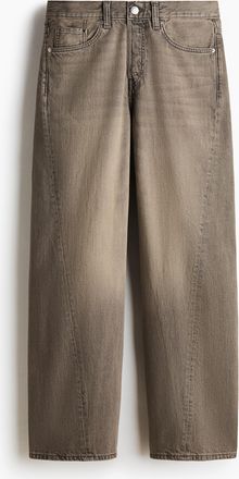 H&M Loose Straight Jeans mit Twisted Leg - Grau