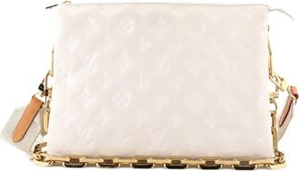 Louis Vuitton Coussin Bag Monogram Embossed Lambskin PM crossbody bag - Wit
