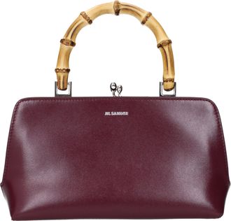 Jil Sander Handtassen Goji Vrouw Met Rode Huid En Donkere Huid