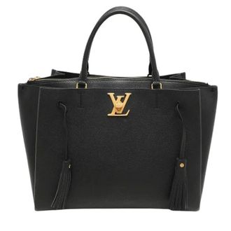 Louis Vuitton Pre-owned Handbags, female, Black, Size: ONE SIZE Pre-owned LockMeto Bag