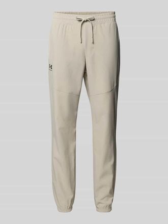 Under Armour Regular Fit Jogger mit Logo-Print Modell Vibe in Khaki, Gr&ouml;&szlig;e XXL