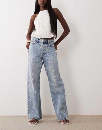 River Island Jeans dritti comodi lavaggio blu medio con margherite ricamate