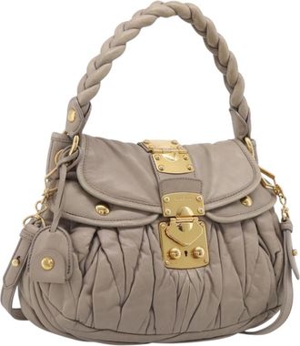Miu Miu Coffer Hobo Matelasse Leather Beige Leather Handbag (Pre-Owned)