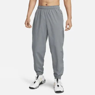 Nike Mens Form Dri-FIT Tapered Versatile Pants in Grey | FB7497-084