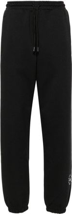 adidas by Stella McCartney loose sweat trousers - women - Recycled Polyester/Organic Cotton - M - Black