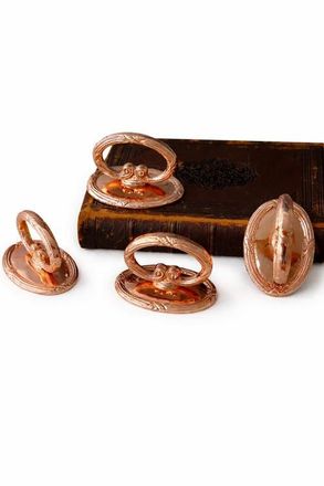 Coppermill Kitchen Vintage Inspired Copper Napkin Rings with Embossed Cross & Bow Pattern - Set of 4 at Nordstrom
