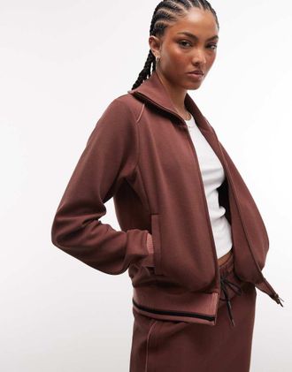 Rains 41040 Downtime - Top sportivo bordeaux con logo e zip doppia in coordinato-Rosso