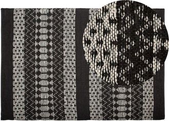 Beliani Beliani - Modern Hand Loomed Area Rug 140x200 cm Leather Cotton Black White Pattern Sokun