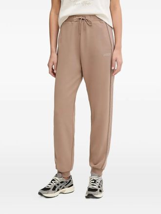 Guess Co logo-embroidered track pants - Neutrals