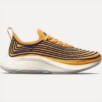 Athletic Propulsion Labs Womens Techloom Zipline Running Sneaker In Mango/royal Navy/ivory