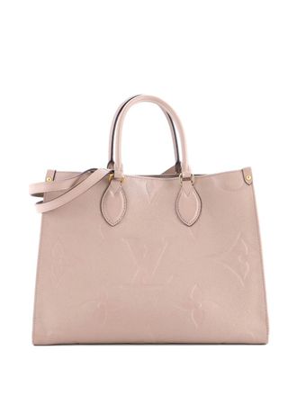 Louis Vuitton OnTheGo Monogram Empreinte Giant MM tote bag - women - Calf Leather/Leather - One Size - Neutrals