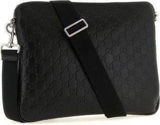 Gucci Bolso de mano de piel con motivo GG en relieve - Bags - Hombre - Negro - ONE SIZE